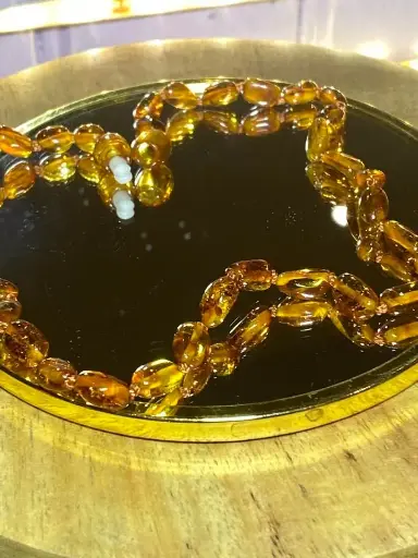 collier ambre bébé
